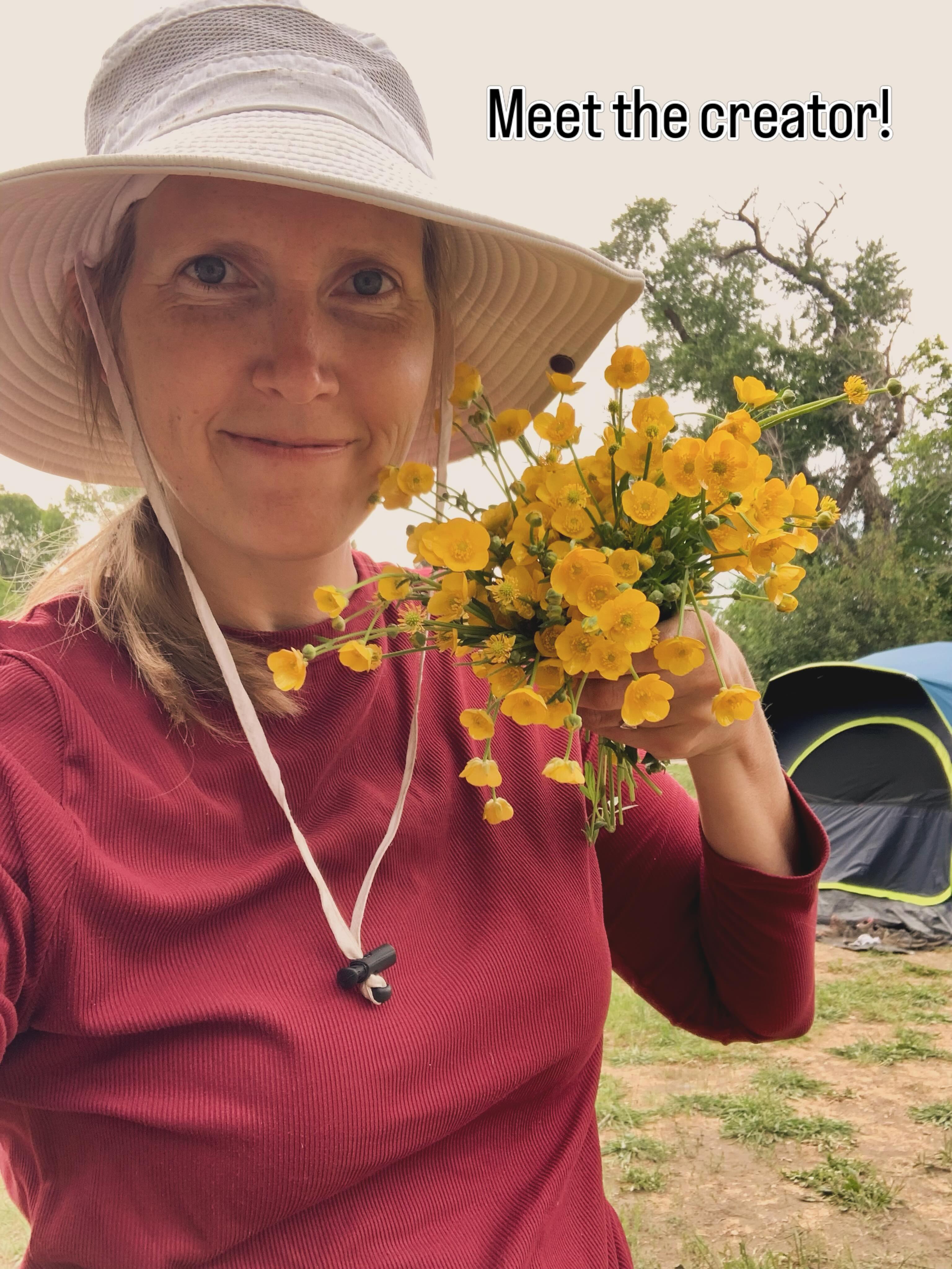 Brianna Fisher holding yellow flowers